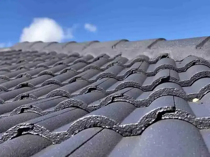Close up of roof tiles being repaired