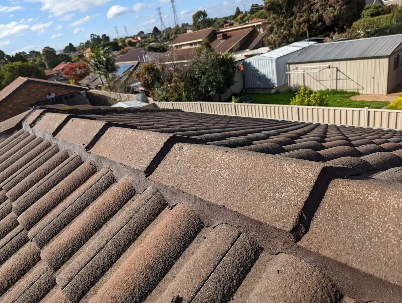 Newly repointed ridge tiles and capping